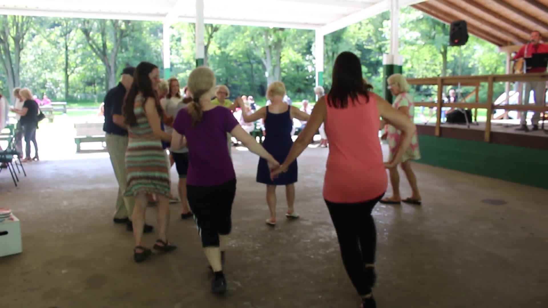 ["Every July, the Mens Club of the Steubenville, Ohio Holy Resurrection Serbian Orthodox Church hosts an annual picnic at their picnic grounds along Kings Creek in Weirton, West Virginia. The event serves as both a fundraiser for the Mens Club and a homecoming for Weirton and Steubenvilles Serbian Community. The event features Serbian music, dance, food, and drink. Mens Club members roast chickens and lambs on spits over open wood fires and sell them to picnic attendees. The spits were constructed out of material from Weirton Steel by Mens Club members and Weirton Steel employees in the 1960s. Other food served at the picnic includes pogacha (a type of Serbian bread), haluski or cabbage and noodles, cevaps (a pork, lamb, and beef sausage), strudel, nut rolls, beer, and Slivovitz.In 2017, state folklorist Emily Hilliard attended the Serbian picnic with Brynn Kusic, whose fathers family is part of the Weirton Serbian community. Learn more about the Annual Picnic via the Holy Resurrection Serbian Orthodox Church: https://www.hrsoc-steubenville.org/annual-picnicSee the short video and audio documentary about the Chicken Blasts, produced by the West Virginia Folklife Program and West Virginia Public Broadcasting: https://wvfolklife.org/2020/01/27/weirtons-serbian-heritage-is-a-chicken-blast/ https://www.youtube.com/watch?v=XpGF-MFUlhYhttps://soundcloud.com/wvpublicnews/weirtons-serbian-heritage-is-a-chicken-blast"]%