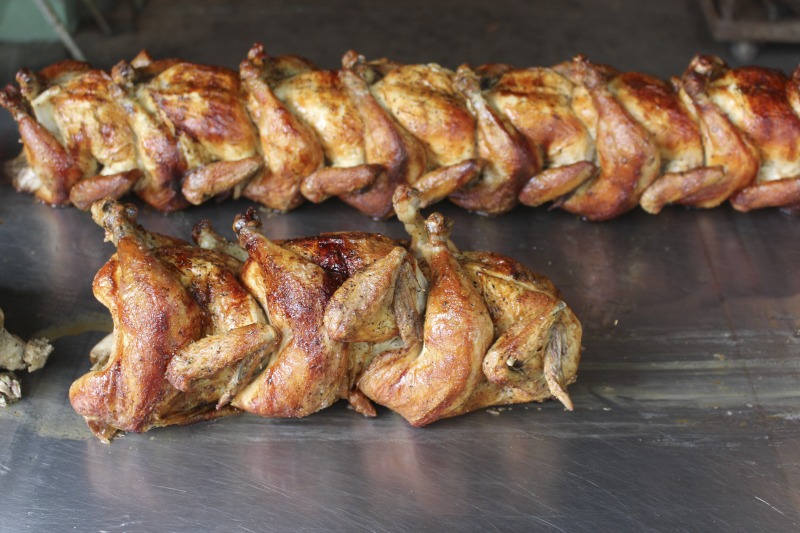 ["Every summer Wednesday since 1969, members of the Serbian Eastern Orthodox Church Mens Club have hosted a Chicken Blast at the Serbian Picnic Grounds along Kings Creek outside of Weirton, West Virginia. They roast 300-400 chickens per week as a fundraiser for the maintenance of the picnic grounds. The spits, an industrial brick oven, and walk-in coolers were constructed in the 1960s out of material from Weirton Steel by Mens Club members, most of whom were Weirton Steel employees. Each week, the choir also sells pogacha (a type of Serbian bread), haluski or cabbage and noodles, corn on the cob, strudel and other desserts. The bar at the picnic grounds is also open, serving beer and Slivovitz.See the short video and audio documentary about the Chicken Blasts, produced by the West Virginia Folklife Program and West Virginia Public Broadcasting: https://wvfolklife.org/2020/01/27/weirtons-serbian-heritage-is-a-chicken-blast/ https://www.youtube.com/watch?v=XpGF-MFUlhYhttps://soundcloud.com/wvpublicnews/weirtons-serbian-heritage-is-a-chicken-blast"]%