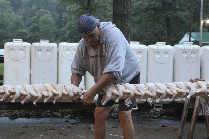 ["Every summer Wednesday since 1969, members of the Serbian Eastern Orthodox Church Mens Club have hosted a Chicken Blast at the Serbian Picnic Grounds along Kings Creek outside of Weirton, West Virginia. They roast 300-400 chickens per week as a fundraiser for the maintenance of the picnic grounds. The spits, an industrial brick oven, and walk-in coolers were constructed in the 1960s out of material from Weirton Steel by Mens Club members, most of whom were Weirton Steel employees. Each week, the choir also sells pogacha (a type of Serbian bread), haluski or cabbage and noodles, corn on the cob, strudel and other desserts. The bar at the picnic grounds is also open, serving beer and Slivovitz.See the short video and audio documentary about the Chicken Blasts, produced by the West Virginia Folklife Program and West Virginia Public Broadcasting: https://wvfolklife.org/2020/01/27/weirtons-serbian-heritage-is-a-chicken-blast/ https://www.youtube.com/watch?v=XpGF-MFUlhYhttps://soundcloud.com/wvpublicnews/weirtons-serbian-heritage-is-a-chicken-blast"]%