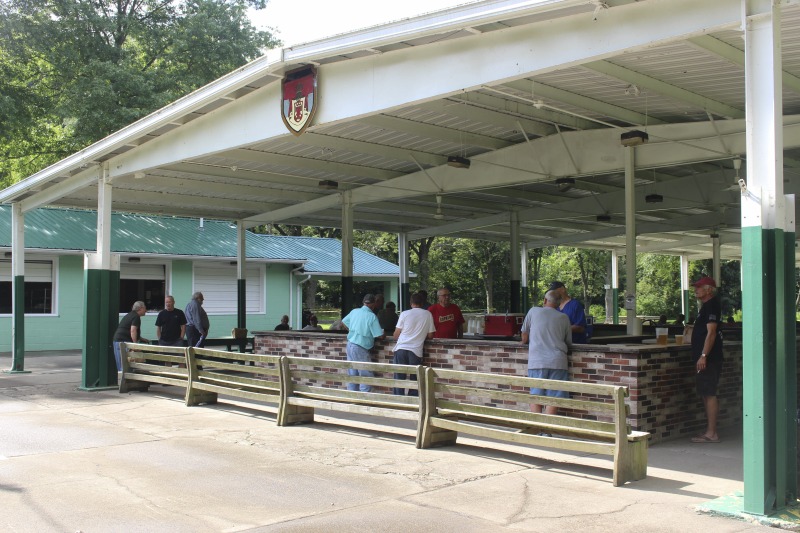 ["Every summer Wednesday since 1969, members of the Serbian Eastern Orthodox Church Mens Club have hosted a Chicken Blast at the Serbian Picnic Grounds along Kings Creek outside of Weirton, West Virginia. They roast 300-400 chickens per week as a fundraiser for the maintenance of the picnic grounds. The spits, an industrial brick oven, and walk-in coolers were constructed in the 1960s out of material from Weirton Steel by Mens Club members, most of whom were Weirton Steel employees. Each week, the choir also sells pogacha (a type of Serbian bread), haluski or cabbage and noodles, corn on the cob, strudel and other desserts. The bar at the picnic grounds is also open, serving beer and Slivovitz.See the short video and audio documentary about the Chicken Blasts, produced by the West Virginia Folklife Program and West Virginia Public Broadcasting: https://wvfolklife.org/2020/01/27/weirtons-serbian-heritage-is-a-chicken-blast/ https://www.youtube.com/watch?v=XpGF-MFUlhYhttps://soundcloud.com/wvpublicnews/weirtons-serbian-heritage-is-a-chicken-blast"]%