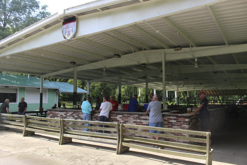 ["Every summer Wednesday since 1969, members of the Serbian Eastern Orthodox Church Mens Club have hosted a Chicken Blast at the Serbian Picnic Grounds along Kings Creek outside of Weirton, West Virginia. They roast 300-400 chickens per week as a fundraiser for the maintenance of the picnic grounds. The spits, an industrial brick oven, and walk-in coolers were constructed in the 1960s out of material from Weirton Steel by Mens Club members, most of whom were Weirton Steel employees. Each week, the choir also sells pogacha (a type of Serbian bread), haluski or cabbage and noodles, corn on the cob, strudel and other desserts. The bar at the picnic grounds is also open, serving beer and Slivovitz.See the short video and audio documentary about the Chicken Blasts, produced by the West Virginia Folklife Program and West Virginia Public Broadcasting: https://wvfolklife.org/2020/01/27/weirtons-serbian-heritage-is-a-chicken-blast/ https://www.youtube.com/watch?v=XpGF-MFUlhYhttps://soundcloud.com/wvpublicnews/weirtons-serbian-heritage-is-a-chicken-blast"]%