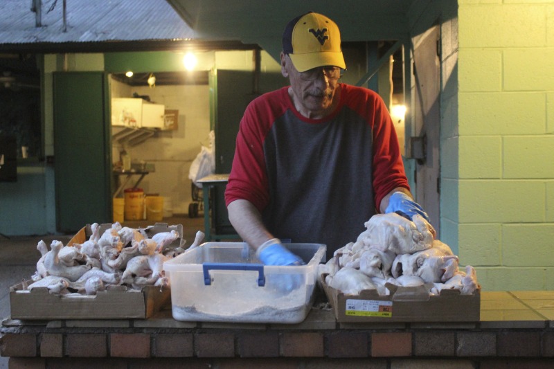 ["Every summer Wednesday since 1969, members of the Serbian Eastern Orthodox Church Mens Club have hosted a Chicken Blast at the Serbian Picnic Grounds along Kings Creek outside of Weirton, West Virginia. They roast 300-400 chickens per week as a fundraiser for the maintenance of the picnic grounds. The spits, an industrial brick oven, and walk-in coolers were constructed in the 1960s out of material from Weirton Steel by Mens Club members, most of whom were Weirton Steel employees. Each week, the choir also sells pogacha (a type of Serbian bread), haluski or cabbage and noodles, corn on the cob, strudel and other desserts. The bar at the picnic grounds is also open, serving beer and Slivovitz.See the short video and audio documentary about the Chicken Blasts, produced by the West Virginia Folklife Program and West Virginia Public Broadcasting: https://wvfolklife.org/2020/01/27/weirtons-serbian-heritage-is-a-chicken-blast/ https://www.youtube.com/watch?v=XpGF-MFUlhYhttps://soundcloud.com/wvpublicnews/weirtons-serbian-heritage-is-a-chicken-blast"]%