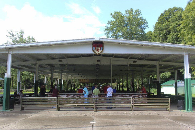 Every summer Wednesday since 1969, members of the Serbian Eastern Orthodox Church Mens Club have hosted a Chicken Blast at the Serbian Picnic Grounds along Kings Creek outside of Weirton, West Virginia. They roast 300-400 chickens per week as a fundraiser for the maintenance of the picnic grounds. The spits, an industrial brick oven, and walk-in coolers were constructed in the 1960s out of material from Weirton Steel by Mens Club members, most of whom were Weirton Steel employees. Each week, the choir also sells pogacha (a type of Serbian bread), haluski or cabbage and noodles, corn on the cob, strudel and other desserts. The bar at the picnic grounds is also open, serving beer and Slivovitz.See the short video and audio documentary about the Chicken Blasts, produced by the West Virginia Folklife Program and West Virginia Public Broadcasting: https://wvfolklife.org/2020/01/27/weirtons-serbian-heritage-is-a-chicken-blast/ https://www.youtube.com/watch?v=XpGF-MFUlhYhttps://soundcloud.com/wvpublicnews/weirtons-serbian-heritage-is-a-chicken-blast