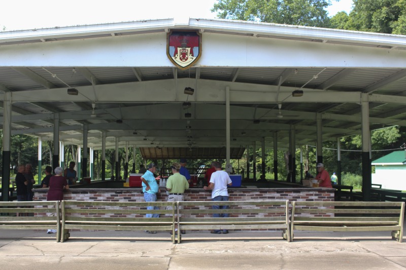 Every summer Wednesday since 1969, members of the Serbian Eastern Orthodox Church Mens Club have hosted a Chicken Blast at the Serbian Picnic Grounds along Kings Creek outside of Weirton, West Virginia. They roast 300-400 chickens per week as a fundraiser for the maintenance of the picnic grounds. The spits, an industrial brick oven, and walk-in coolers were constructed in the 1960s out of material from Weirton Steel by Mens Club members, most of whom were Weirton Steel employees. Each week, the choir also sells pogacha (a type of Serbian bread), haluski or cabbage and noodles, corn on the cob, strudel and other desserts. The bar at the picnic grounds is also open, serving beer and Slivovitz.See the short video and audio documentary about the Chicken Blasts, produced by the West Virginia Folklife Program and West Virginia Public Broadcasting: https://wvfolklife.org/2020/01/27/weirtons-serbian-heritage-is-a-chicken-blast/ https://www.youtube.com/watch?v=XpGF-MFUlhYhttps://soundcloud.com/wvpublicnews/weirtons-serbian-heritage-is-a-chicken-blast