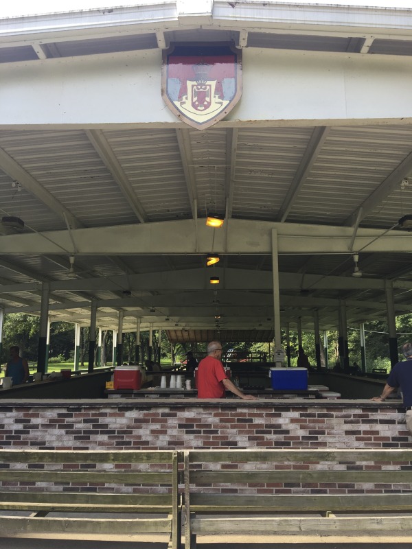 Every summer Wednesday since 1969, members of the Serbian Eastern Orthodox Church Mens Club have hosted a Chicken Blast at the Serbian Picnic Grounds along Kings Creek outside of Weirton, West Virginia. They roast 300-400 chickens per week as a fundraiser for the maintenance of the picnic grounds. The spits, an industrial brick oven, and walk-in coolers were constructed in the 1960s out of material from Weirton Steel by Mens Club members, most of whom were Weirton Steel employees. Each week, the choir also sells pogacha (a type of Serbian bread), haluski or cabbage and noodles, corn on the cob, strudel and other desserts. The bar at the picnic grounds is also open, serving beer and Slivovitz.See the short video and audio documentary about the Chicken Blasts, produced by the West Virginia Folklife Program and West Virginia Public Broadcasting: https://wvfolklife.org/2020/01/27/weirtons-serbian-heritage-is-a-chicken-blast/ https://www.youtube.com/watch?v=XpGF-MFUlhYhttps://soundcloud.com/wvpublicnews/weirtons-serbian-heritage-is-a-chicken-blast