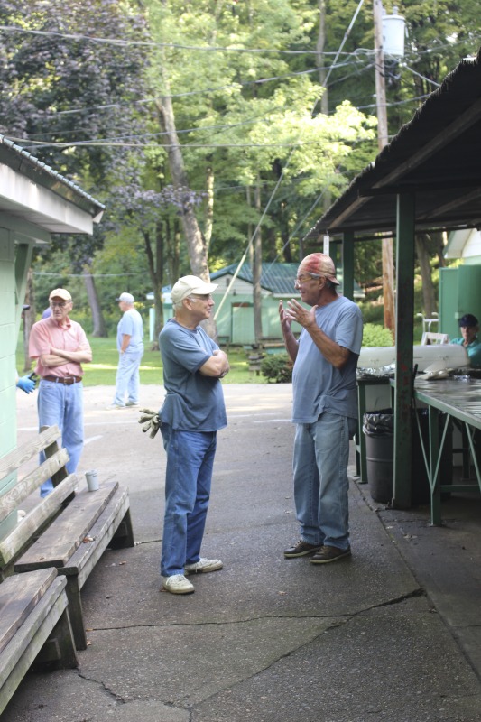 Every summer Wednesday since 1969, members of the Serbian Eastern Orthodox Church Mens Club have hosted a Chicken Blast at the Serbian Picnic Grounds along Kings Creek outside of Weirton, West Virginia. They roast 300-400 chickens per week as a fundraiser for the maintenance of the picnic grounds. The spits, an industrial brick oven, and walk-in coolers were constructed in the 1960s out of material from Weirton Steel by Mens Club members, most of whom were Weirton Steel employees. Each week, the choir also sells pogacha (a type of Serbian bread), haluski or cabbage and noodles, corn on the cob, strudel and other desserts. The bar at the picnic grounds is also open, serving beer and Slivovitz.See the short video and audio documentary about the Chicken Blasts, produced by the West Virginia Folklife Program and West Virginia Public Broadcasting: https://wvfolklife.org/2020/01/27/weirtons-serbian-heritage-is-a-chicken-blast/ https://www.youtube.com/watch?v=XpGF-MFUlhYhttps://soundcloud.com/wvpublicnews/weirtons-serbian-heritage-is-a-chicken-blast