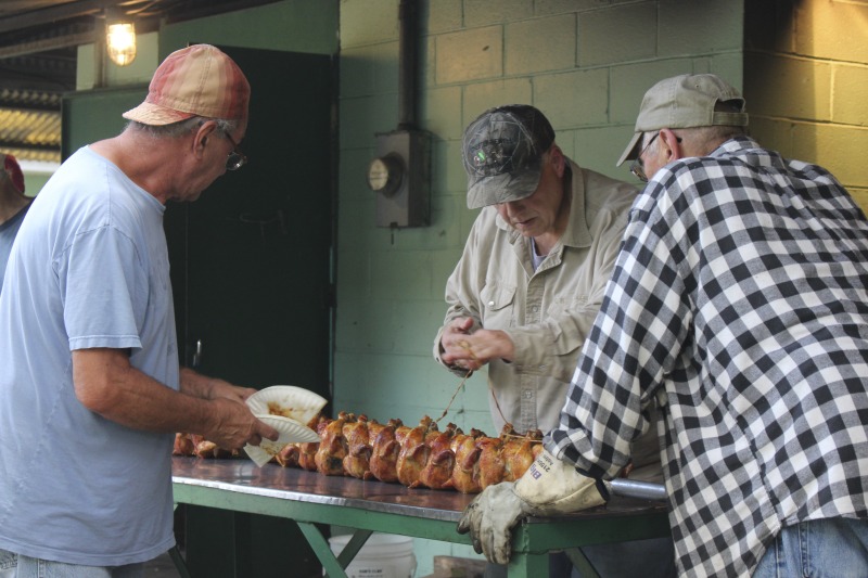 Every summer Wednesday since 1969, members of the Serbian Eastern Orthodox Church Mens Club have hosted a Chicken Blast at the Serbian Picnic Grounds along Kings Creek outside of Weirton, West Virginia. They roast 300-400 chickens per week as a fundraiser for the maintenance of the picnic grounds. The spits, an industrial brick oven, and walk-in coolers were constructed in the 1960s out of material from Weirton Steel by Mens Club members, most of whom were Weirton Steel employees. Each week, the choir also sells pogacha (a type of Serbian bread), haluski or cabbage and noodles, corn on the cob, strudel and other desserts. The bar at the picnic grounds is also open, serving beer and Slivovitz.See the short video and audio documentary about the Chicken Blasts, produced by the West Virginia Folklife Program and West Virginia Public Broadcasting: https://wvfolklife.org/2020/01/27/weirtons-serbian-heritage-is-a-chicken-blast/ https://www.youtube.com/watch?v=XpGF-MFUlhYhttps://soundcloud.com/wvpublicnews/weirtons-serbian-heritage-is-a-chicken-blast