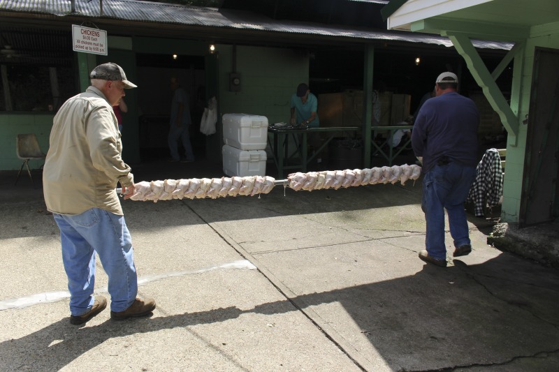 Every summer Wednesday since 1969, members of the Serbian Eastern Orthodox Church Mens Club have hosted a Chicken Blast at the Serbian Picnic Grounds along Kings Creek outside of Weirton, West Virginia. They roast 300-400 chickens per week as a fundraiser for the maintenance of the picnic grounds. The spits, an industrial brick oven, and walk-in coolers were constructed in the 1960s out of material from Weirton Steel by Mens Club members, most of whom were Weirton Steel employees. Each week, the choir also sells pogacha (a type of Serbian bread), haluski or cabbage and noodles, corn on the cob, strudel and other desserts. The bar at the picnic grounds is also open, serving beer and Slivovitz.See the short video and audio documentary about the Chicken Blasts, produced by the West Virginia Folklife Program and West Virginia Public Broadcasting: https://wvfolklife.org/2020/01/27/weirtons-serbian-heritage-is-a-chicken-blast/ https://www.youtube.com/watch?v=XpGF-MFUlhYhttps://soundcloud.com/wvpublicnews/weirtons-serbian-heritage-is-a-chicken-blast