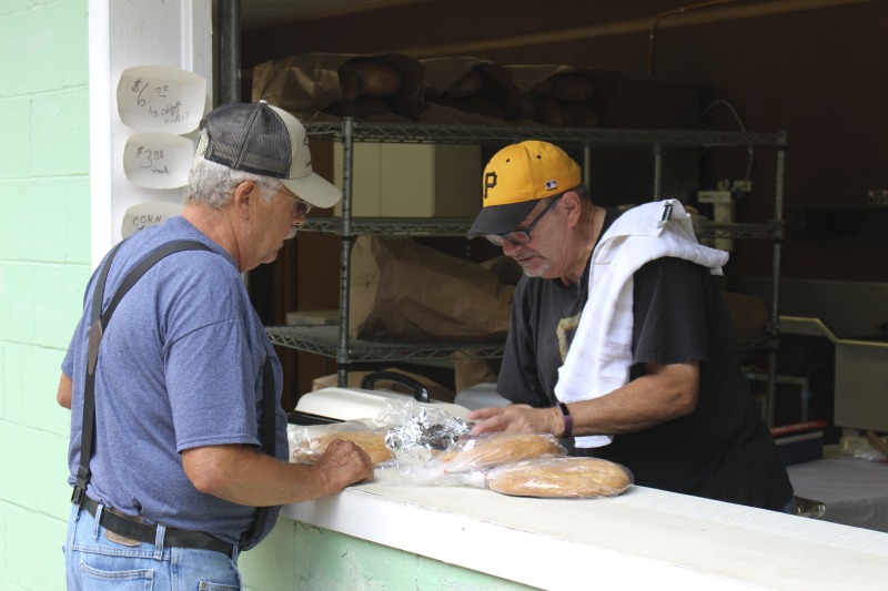 ["Every summer Wednesday since 1969, members of the Serbian Eastern Orthodox Church Mens Club have hosted a Chicken Blast at the Serbian Picnic Grounds along Kings Creek outside of Weirton, West Virginia. They roast 300-400 chickens per week as a fundraiser for the maintenance of the picnic grounds. The spits, an industrial brick oven, and walk-in coolers were constructed in the 1960s out of material from Weirton Steel by Mens Club members, most of whom were Weirton Steel employees. Each week, the choir also sells pogacha (a type of Serbian bread), haluski or cabbage and noodles, corn on the cob, strudel and other desserts. The bar at the picnic grounds is also open, serving beer and Slivovitz.See the short video and audio documentary about the Chicken Blasts, produced by the West Virginia Folklife Program and West Virginia Public Broadcasting: https://wvfolklife.org/2020/01/27/weirtons-serbian-heritage-is-a-chicken-blast/ https://www.youtube.com/watch?v=XpGF-MFUlhYhttps://soundcloud.com/wvpublicnews/weirtons-serbian-heritage-is-a-chicken-blast"]%