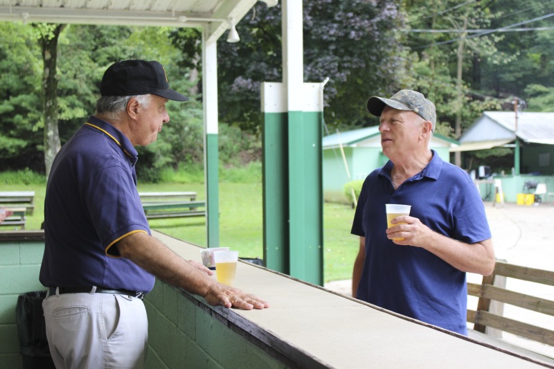 Every summer Wednesday since 1969, members of the Serbian Eastern Orthodox Church Mens Club have hosted a Chicken Blast at the Serbian Picnic Grounds along Kings Creek outside of Weirton, West Virginia. They roast 300-400 chickens per week as a fundraiser for the maintenance of the picnic grounds. The spits, an industrial brick oven, and walk-in coolers were constructed in the 1960s out of material from Weirton Steel by Mens Club members, most of whom were Weirton Steel employees. Each week, the choir also sells pogacha (a type of Serbian bread), haluski or cabbage and noodles, corn on the cob, strudel and other desserts. The bar at the picnic grounds is also open, serving beer and Slivovitz.See the short video and audio documentary about the Chicken Blasts, produced by the West Virginia Folklife Program and West Virginia Public Broadcasting: https://wvfolklife.org/2020/01/27/weirtons-serbian-heritage-is-a-chicken-blast/ https://www.youtube.com/watch?v=XpGF-MFUlhYhttps://soundcloud.com/wvpublicnews/weirtons-serbian-heritage-is-a-chicken-blast