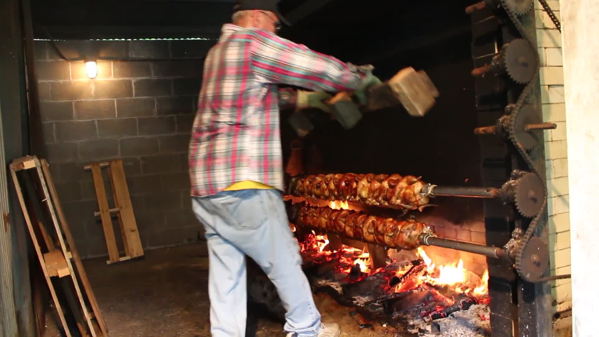 ["Every summer Wednesday since 1969, members of the Serbian Eastern Orthodox Church Mens Club have hosted a Chicken Blast at the Serbian Picnic Grounds along Kings Creek outside of Weirton, West Virginia. They roast 300-400 chickens per week as a fundraiser for the maintenance of the picnic grounds. The spits, an industrial brick oven, and walk-in coolers were constructed in the 1960s out of material from Weirton Steel by Mens Club members, most of whom were Weirton Steel employees. Each week, the choir also sells pogacha (a type of Serbian bread), haluski or cabbage and noodles, corn on the cob, strudel and other desserts. The bar at the picnic grounds is also open, serving beer and Slivovitz.See the short video and audio documentary about the Chicken Blasts, produced by the West Virginia Folklife Program and West Virginia Public Broadcasting: https://wvfolklife.org/2020/01/27/weirtons-serbian-heritage-is-a-chicken-blast/ https://www.youtube.com/watch?v=XpGF-MFUlhYhttps://soundcloud.com/wvpublicnews/weirtons-serbian-heritage-is-a-chicken-blast"]%