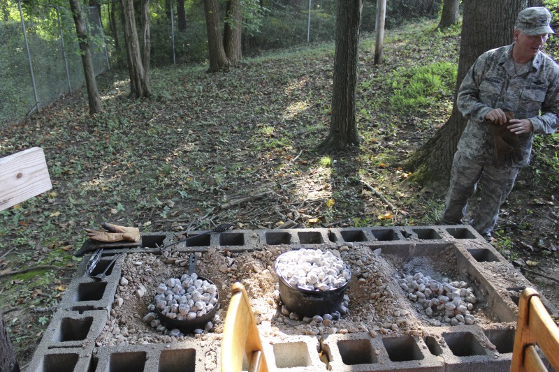 ["On September 21, 2017, old-time musician and writer Pete Koskys Appalachian Studies class at South Charleston High School made biscuits in a cast iron Dutch oven over a charcoal fire at the ROTC picnic shelter on the school campus. Kosky invited state folklorist Emily Hilliard to the class."]%