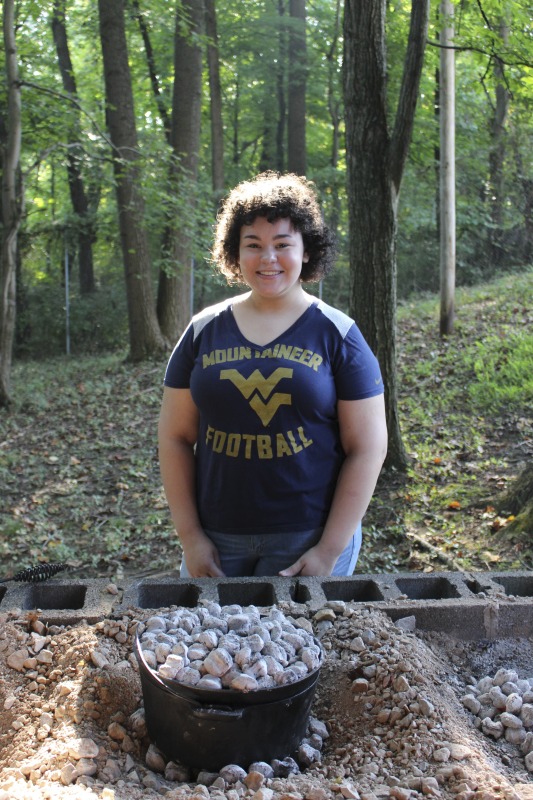 ["On September 21, 2017, old-time musician and writer Pete Koskys Appalachian Studies class at South Charleston High School made biscuits in a cast iron Dutch oven over a charcoal fire at the ROTC picnic shelter on the school campus. Kosky invited state folklorist Emily Hilliard to the class."]%