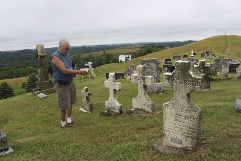 ["St. Joseph Settlement aka the German Settlement is a rural community of farms on the Marshall-Wetzel County borders, settled by German Catholic immigrants in the 1850s. As Cheryl Harshman says in her e-WV article on the settlement, the church, schoolhouse (now a public library and parish museum), rectory, community building, and cemetery are still the heart of the St. Joseph community.On June 22, 2016, Harshman hosted state folklorist Emily Hilliard on a visit to the settlement, meeting community members Jim and Debbie Frohnapfel and Ray Estep and visiting the church and cemetery.Learn more via e-WV: https://www.wvencyclopedia.org/articles/158"]%