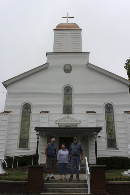 ["St. Joseph Settlement aka the German Settlement is a rural community of farms on the Marshall-Wetzel County borders, settled by German Catholic immigrants in the 1850s. As Cheryl Harshman says in her e-WV article on the settlement, the church, schoolhouse (now a public library and parish museum), rectory, community building, and cemetery are still the heart of the St. Joseph community.On June 22, 2016, Harshman hosted state folklorist Emily Hilliard on a visit to the settlement, meeting community members Jim and Debbie Frohnapfel and Ray Estep and visiting the church and cemetery.Learn more via e-WV: https://www.wvencyclopedia.org/articles/158"]%