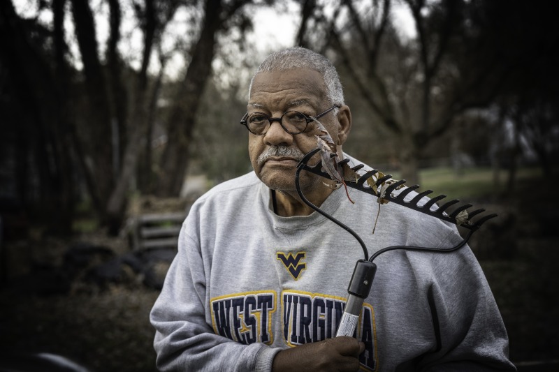 ["Thomas Toliver, 87, at the time of the interview, is an urban gardener of the West Side of Charleston. He works in prisons as a mentor, and has taken in children of incarcerated people through his organization Family Youth in Development Service, Men and Children of Prisoners. In his urban garden, he is particularly interested in working with unhoused people. Toliver grew up working on a plantation-like estate in the Charleston neighborhood of South Hills, where his father was a gardener and chauffeur and his mother was a maid. Toliver was interviewed by producer Aaron Henkin with Emily Hilliard as part of the Out of the Blocks podcasts two episodes on Charlestons West Side. Learn more: https://wvfolklife.org/2020/01/17/out-of-the-blocks-podcast-highlights-charlestons-west-side-west-virginia-folklife-hosts-listening-party-february-12/"]%