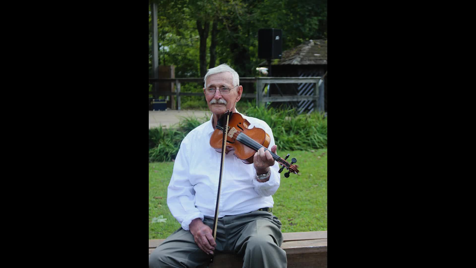 ["Vernon John Burky was born to a Swiss family in Helvetia, West Virginia in 1925. He grew up speaking Swiss on his family farm, where his parents raised animals and managed a sawmill, and his grandparents operated a cheese house. They made Helvetia cheese, a type of Swiss cheese, similar to Emental, that was made throughout the Helvetia community and a staple in the diet of residents. As a child, Burky raised chickens and tapped maple trees on his family farm. As an adult, he was an active winemaker, a common pursuit in the Helvetia community. During his working years, Burky worked as a truck driver for a saw mill and a coal company. He learned to play fiddle as a child and started playing in the Helvetia Star Band, the local dance band for generations and the namesake of one of the villages two dance halls. He still plays in the group, which performs regularly for Helvetia square dances and events. Yeah; just kept that smokehouse full of smoke all day and night. Theyd put a big hunk of wood on it; it wouldnt burn but it--they had fire under it and it would sit there and smoke that little room half as big as this. They just smoked up tight. They had the sausage on rods; nothing could come in or get up on there. There it would sit; it was just dried up real solid and my uncle was--I stayed with my uncle when I was in high school. And he said, hey Vernon; come over here. (Laughs) He had rheumatism and he couldnt move around. He was in bed all winter. Go up there to the smokehouse and get me a link of that sausage. (Laughs) And Id go up and clip one of them off and bring it down. Hed get a hold of one piece and put the rest under the pillow and hed start eating that. He wasnt supposed to have red meat because of rheumatism.This audio slideshow is part of a series of interviews conducted with foodways practitioners in Helvetia, West Virginia, as part of the Helvetia Foodways Oral History Project in partnership with the Southern Foodways Alliance. Learn more: https://www.southernfoodways.org/oral-history/helvetia-west-virginia/"]%