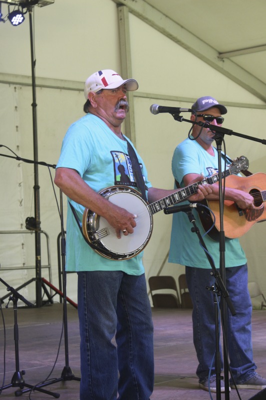 From the Mountain Music Trail: "The Black Mountain Bluegrass Boys are among West Virginias longest-running bluegrass bands. The group first organized in 1968 around the foursome of Richard Hefner (banjo/tenor vocal), his brother Bill Hefner (guitar/mandolin/baritone vocal), their late uncle Glenn Dude Irvine (mandolin) and the late Harley Carpenter (guitar/lead vocal). They took their name from Black Mountain in their native Pocahontas County. For five years the group worked a weekly radio show on WVAR, in Richwood. They also made regular appearances at local events and regional bluegrass festivals. They recorded their first album in January 1971, Pure Old Bluegrass, and in the mid-1970s they followed up with a pair of albums: Million Lonely Days and Talk of the County. More recent albums include Black Mountain Bluegrass Boys 1968-1973, Live at Midnight, Live at The Opera House, and Live at Greenbrier Valley Theatre.As with many bluegrass bands, the Black Mountain Bluegrass Boys have had changes in personnel over the years. Richard Hefner remains as the lone original member. Hefners traditional bluegrass banjo playing and tenor vocals have contributed both continuity and much of the high lonesome sound for which the band has become so well-known. He has displayed his banjo skills many times as a victor in contests and at the Vandalia Festival. Chris Nickell from Monroe County, contributes driving lead and rhythm guitar work as well as lead vocals. Rick Carpenterson of founding member Harley Carpenterpicks a fine mandolin and sings lead and baritone vocals. Bass player Mike Smith, of Culloden, has worked with such notables as Larry Sparks, Dave Evans, and the Goins Brothers."Read more: https://mountainmusictrail.com/the-black-mountain-bluegrass-boys/