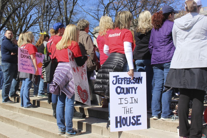 ["On February 22, 2018, thousands of West Virginia public school teachers and school service employees walked out of their classrooms in what would become a nine-day statewide strike. Teachers demands included a 5% raise and affordable healthcare coverage through the West Virginia Public Employees Insurance Agency or PEIA. These photos are part of a series of photos, videos, and interviews documenting the labor lore and expressive culture of the 2018 and 2019 West Virginia Teachers Strike.For more information on the 2018 and 2019 West Virginia Teachers Strike visit e-WV: https://www.wvencyclopedia.org/articles/2454"]%