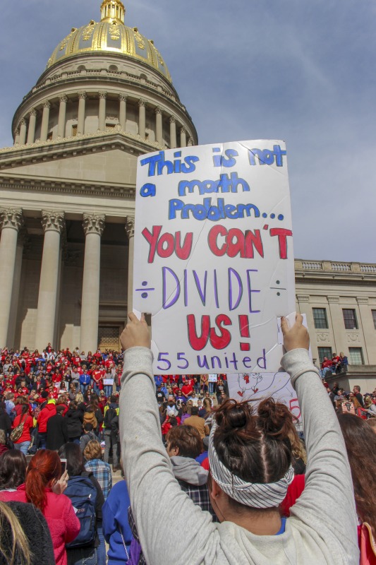 ["On February 22, 2018, thousands of West Virginia public school teachers and school service employees walked out of their classrooms in what would become a nine-day statewide strike. Teachers demands included a 5% raise and affordable healthcare coverage through the West Virginia Public Employees Insurance Agency or PEIA. These photos are part of a series of photos, videos, and interviews documenting the labor lore and expressive culture of the 2018 and 2019 West Virginia Teachers Strike.For more information on the 2018 and 2019 West Virginia Teachers Strike visit e-WV: https://www.wvencyclopedia.org/articles/2454"]%