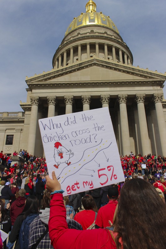 On February 22, 2018, thousands of West Virginia public school teachers and school service employees walked out of their classrooms in what would become a nine-day statewide strike. Teachers demands included a 5% raise and affordable healthcare coverage through the West Virginia Public Employees Insurance Agency or PEIA. These photos are part of a series of photos, videos, and interviews documenting the labor lore and expressive culture of the 2018 and 2019 West Virginia Teachers Strike.For more information on the 2018 and 2019 West Virginia Teachers Strike visit e-WV: https://www.wvencyclopedia.org/articles/2454