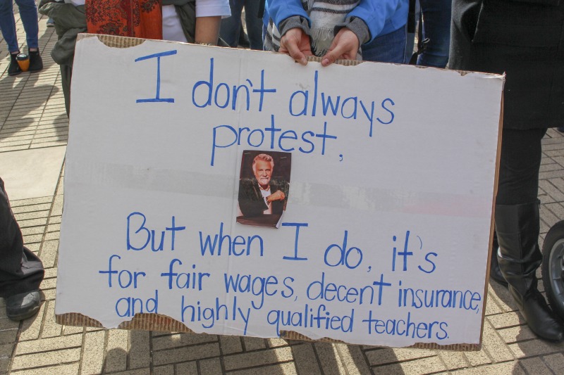 ["On February 22, 2018, thousands of West Virginia public school teachers and school service employees walked out of their classrooms in what would become a nine-day statewide strike. Teachers demands included a 5% raise and affordable healthcare coverage through the West Virginia Public Employees Insurance Agency or PEIA. These photos are part of a series of photos, videos, and interviews documenting the labor lore and expressive culture of the 2018 and 2019 West Virginia Teachers Strike.For more information on the 2018 and 2019 West Virginia Teachers Strike visit e-WV: https://www.wvencyclopedia.org/articles/2454"]%