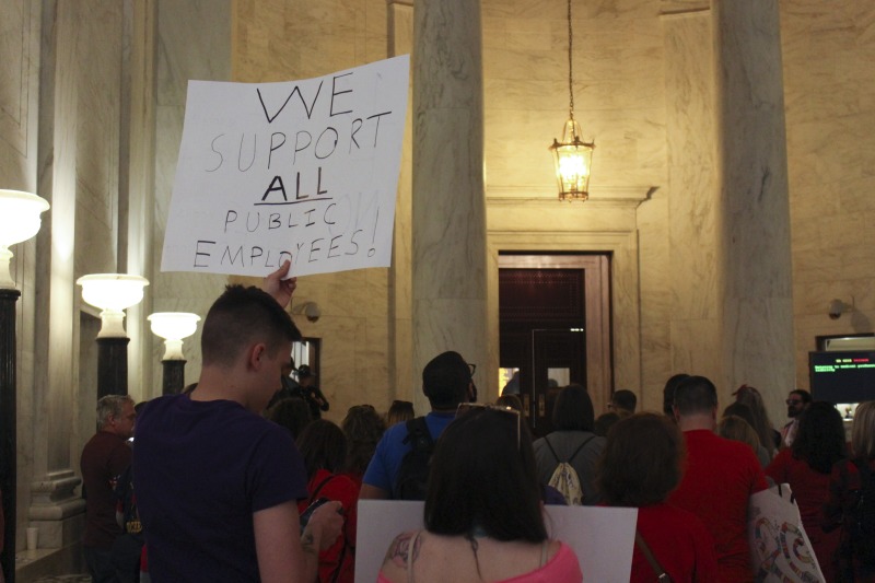 ["On February 22, 2018, thousands of West Virginia public school teachers and school service employees walked out of their classrooms in what would become a nine-day statewide strike. Teachers demands included a 5% raise and affordable healthcare coverage through the West Virginia Public Employees Insurance Agency or PEIA. These photos are part of a series of photos, videos, and interviews documenting the labor lore and expressive culture of the 2018 and 2019 West Virginia Teachers Strike.For more information on the 2018 and 2019 West Virginia Teachers Strike visit e-WV: https://www.wvencyclopedia.org/articles/2454"]%