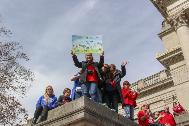 On February 22, 2018, thousands of West Virginia public school teachers and school service employees walked out of their classrooms in what would become a nine-day statewide strike. Teachers demands included a 5% raise and affordable healthcare coverage through the West Virginia Public Employees Insurance Agency or PEIA. These photos are part of a series of photos, videos, and interviews documenting the labor lore and expressive culture of the 2018 and 2019 West Virginia Teachers Strike.For more information on the 2018 and 2019 West Virginia Teachers Strike visit e-WV: https://www.wvencyclopedia.org/articles/2454