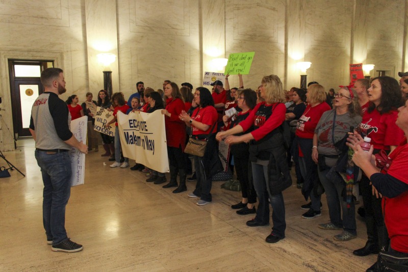 On February 22, 2018, thousands of West Virginia public school teachers and school service employees walked out of their classrooms in what would become a nine-day statewide strike. Teachers demands included a 5% raise and affordable healthcare coverage through the West Virginia Public Employees Insurance Agency or PEIA. These photos are part of a series of photos, videos, and interviews documenting the labor lore and expressive culture of the 2018 and 2019 West Virginia Teachers Strike.For more information on the 2018 and 2019 West Virginia Teachers Strike visit e-WV: https://www.wvencyclopedia.org/articles/2454