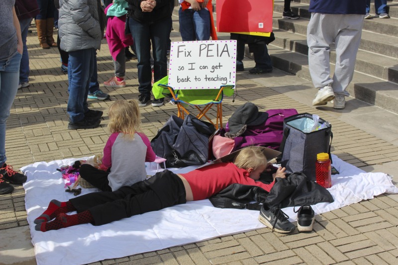 On February 22, 2018, thousands of West Virginia public school teachers and school service employees walked out of their classrooms in what would become a nine-day statewide strike. Teachers demands included a 5% raise and affordable healthcare coverage through the West Virginia Public Employees Insurance Agency or PEIA. These photos are part of a series of photos, videos, and interviews documenting the labor lore and expressive culture of the 2018 and 2019 West Virginia Teachers Strike.For more information on the 2018 and 2019 West Virginia Teachers Strike visit e-WV: https://www.wvencyclopedia.org/articles/2454