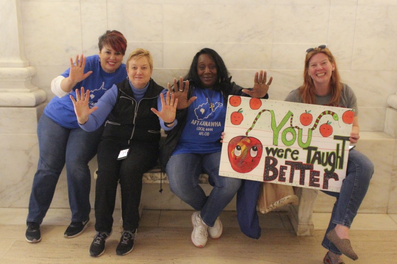 ["On February 22, 2018, thousands of West Virginia public school teachers and school service employees walked out of their classrooms in what would become a nine-day statewide strike. Teachers demands included a 5% raise and affordable healthcare coverage through the West Virginia Public Employees Insurance Agency or PEIA. These photos are part of a series of photos, videos, and interviews documenting the labor lore and expressive culture of the 2018 and 2019 West Virginia Teachers Strike.For more information on the 2018 and 2019 West Virginia Teachers Strike visit e-WV: https://www.wvencyclopedia.org/articles/2454"]%