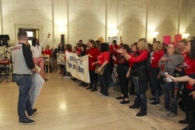 On February 22, 2018, thousands of West Virginia public school teachers and school service employees walked out of their classrooms in what would become a nine-day statewide strike. Teachers demands included a 5% raise and affordable healthcare coverage through the West Virginia Public Employees Insurance Agency or PEIA. These photos are part of a series of photos, videos, and interviews documenting the labor lore and expressive culture of the 2018 and 2019 West Virginia Teachers Strike.For more information on the 2018 and 2019 West Virginia Teachers Strike visit e-WV: https://www.wvencyclopedia.org/articles/2454