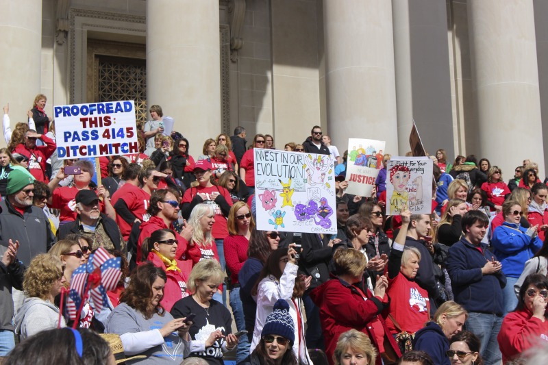 ["On February 22, 2018, thousands of West Virginia public school teachers and school service employees walked out of their classrooms in what would become a nine-day statewide strike. Teachers demands included a 5% raise and affordable healthcare coverage through the West Virginia Public Employees Insurance Agency or PEIA. These photos are part of a series of photos, videos, and interviews documenting the labor lore and expressive culture of the 2018 and 2019 West Virginia Teachers Strike.For more information on the 2018 and 2019 West Virginia Teachers Strike visit e-WV: https://www.wvencyclopedia.org/articles/2454"]%