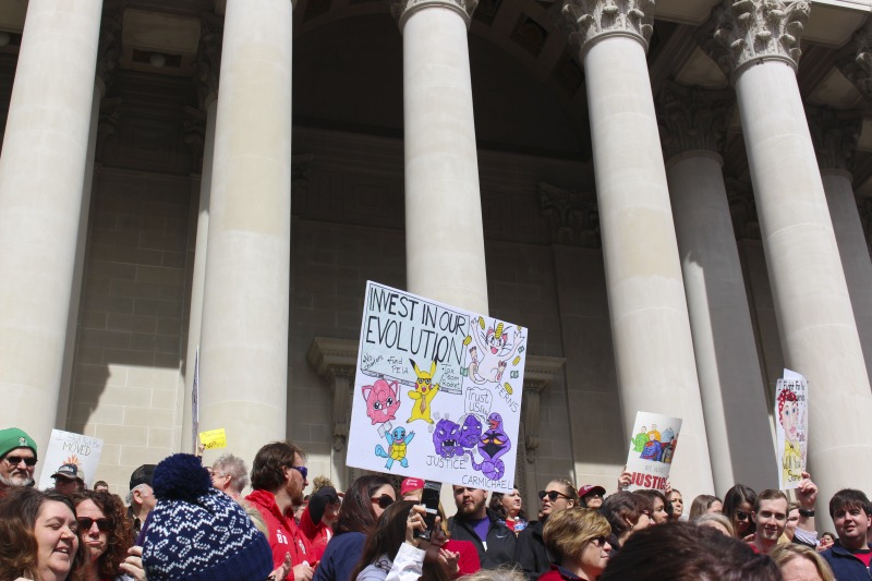 ["On February 22, 2018, thousands of West Virginia public school teachers and school service employees walked out of their classrooms in what would become a nine-day statewide strike. Teachers demands included a 5% raise and affordable healthcare coverage through the West Virginia Public Employees Insurance Agency or PEIA. These photos are part of a series of photos, videos, and interviews documenting the labor lore and expressive culture of the 2018 and 2019 West Virginia Teachers Strike.For more information on the 2018 and 2019 West Virginia Teachers Strike visit e-WV: https://www.wvencyclopedia.org/articles/2454"]%