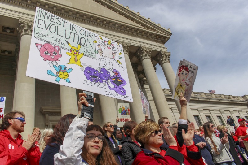 On February 22, 2018, thousands of West Virginia public school teachers and school service employees walked out of their classrooms in what would become a nine-day statewide strike. Teachers demands included a 5% raise and affordable healthcare coverage through the West Virginia Public Employees Insurance Agency or PEIA. These photos are part of a series of photos, videos, and interviews documenting the labor lore and expressive culture of the 2018 and 2019 West Virginia Teachers Strike.For more information on the 2018 and 2019 West Virginia Teachers Strike visit e-WV: https://www.wvencyclopedia.org/articles/2454