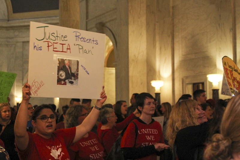 ["On February 22, 2018, thousands of West Virginia public school teachers and school service employees walked out of their classrooms in what would become a nine-day statewide strike. Teachers demands included a 5% raise and affordable healthcare coverage through the West Virginia Public Employees Insurance Agency or PEIA. These photos are part of a series of photos, videos, and interviews documenting the labor lore and expressive culture of the 2018 and 2019 West Virginia Teachers Strike.For more information on the 2018 and 2019 West Virginia Teachers Strike visit e-WV: https://www.wvencyclopedia.org/articles/2454"]%