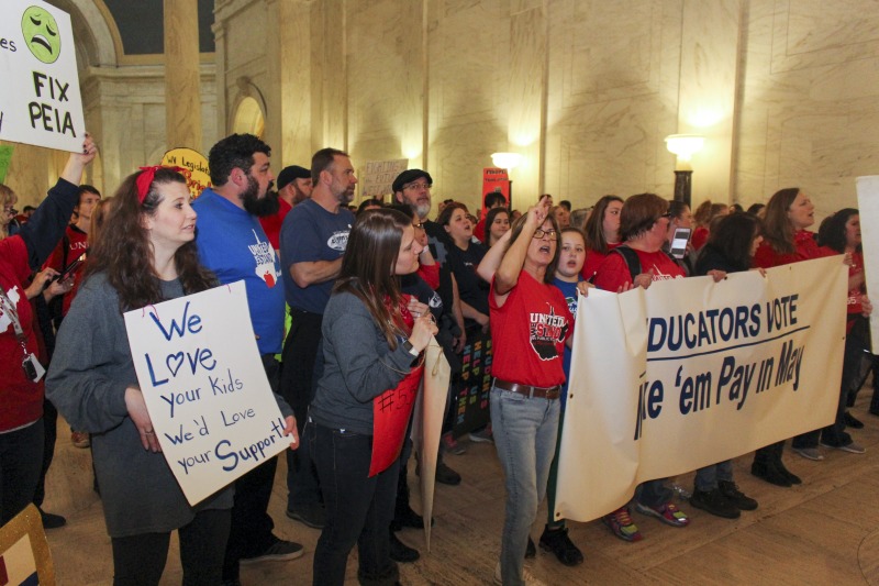 On February 22, 2018, thousands of West Virginia public school teachers and school service employees walked out of their classrooms in what would become a nine-day statewide strike. Teachers demands included a 5% raise and affordable healthcare coverage through the West Virginia Public Employees Insurance Agency or PEIA. These photos are part of a series of photos, videos, and interviews documenting the labor lore and expressive culture of the 2018 and 2019 West Virginia Teachers Strike.For more information on the 2018 and 2019 West Virginia Teachers Strike visit e-WV: https://www.wvencyclopedia.org/articles/2454