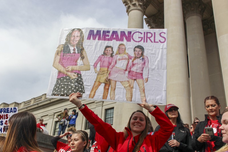 On February 22, 2018, thousands of West Virginia public school teachers and school service employees walked out of their classrooms in what would become a nine-day statewide strike. Teachers demands included a 5% raise and affordable healthcare coverage through the West Virginia Public Employees Insurance Agency or PEIA. These photos are part of a series of photos, videos, and interviews documenting the labor lore and expressive culture of the 2018 and 2019 West Virginia Teachers Strike.For more information on the 2018 and 2019 West Virginia Teachers Strike visit e-WV: https://www.wvencyclopedia.org/articles/2454