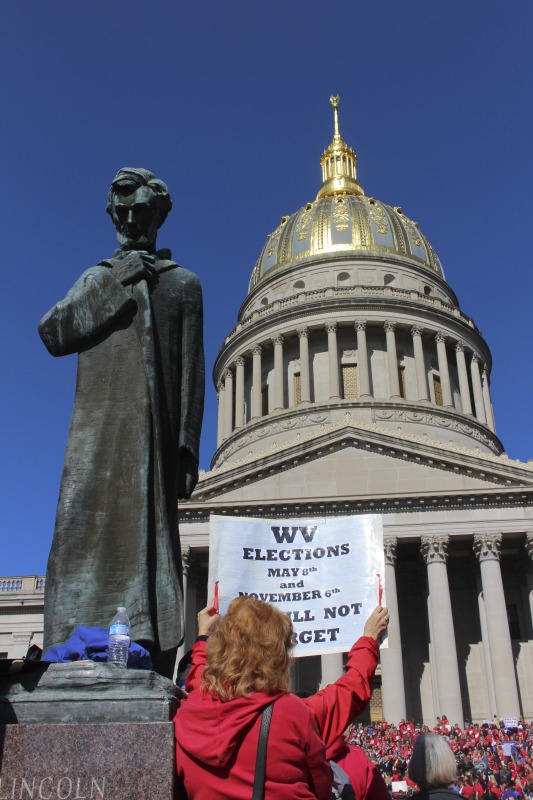 ["On February 22, 2018, thousands of West Virginia public school teachers and school service employees walked out of their classrooms in what would become a nine-day statewide strike. Teachers demands included a 5% raise and affordable healthcare coverage through the West Virginia Public Employees Insurance Agency or PEIA. These photos are part of a series of photos, videos, and interviews documenting the labor lore and expressive culture of the 2018 and 2019 West Virginia Teachers Strike.For more information on the 2018 and 2019 West Virginia Teachers Strike visit e-WV: https://www.wvencyclopedia.org/articles/2454"]%