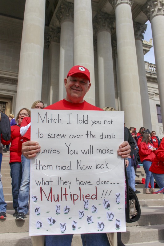 ["On February 22, 2018, thousands of West Virginia public school teachers and school service employees walked out of their classrooms in what would become a nine-day statewide strike. Teachers demands included a 5% raise and affordable healthcare coverage through the West Virginia Public Employees Insurance Agency or PEIA. These photos are part of a series of photos, videos, and interviews documenting the labor lore and expressive culture of the 2018 and 2019 West Virginia Teachers Strike.For more information on the 2018 and 2019 West Virginia Teachers Strike visit e-WV: https://www.wvencyclopedia.org/articles/2454"]%