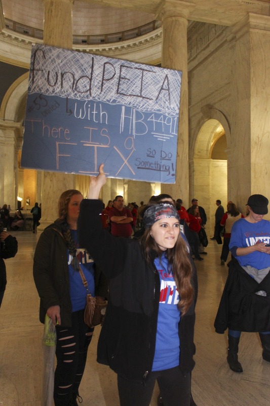 ["On February 22, 2018, thousands of West Virginia public school teachers and school service employees walked out of their classrooms in what would become a nine-day statewide strike. Teachers demands included a 5% raise and affordable healthcare coverage through the West Virginia Public Employees Insurance Agency or PEIA. These photos are part of a series of photos, videos, and interviews documenting the labor lore and expressive culture of the 2018 and 2019 West Virginia Teachers Strike.For more information on the 2018 and 2019 West Virginia Teachers Strike visit e-WV: https://www.wvencyclopedia.org/articles/2454"]%