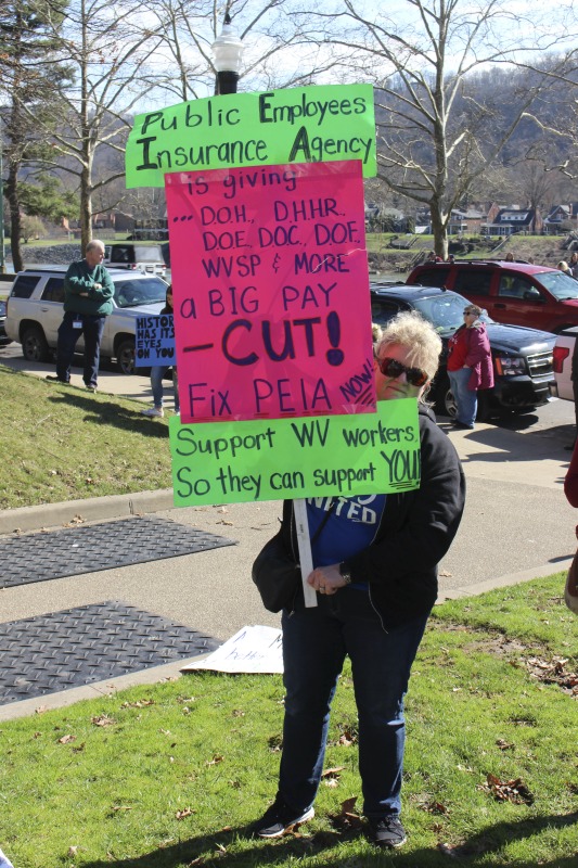 ["On February 22, 2018, thousands of West Virginia public school teachers and school service employees walked out of their classrooms in what would become a nine-day statewide strike. Teachers demands included a 5% raise and affordable healthcare coverage through the West Virginia Public Employees Insurance Agency or PEIA. These photos are part of a series of photos, videos, and interviews documenting the labor lore and expressive culture of the 2018 and 2019 West Virginia Teachers Strike.For more information on the 2018 and 2019 West Virginia Teachers Strike visit e-WV: https://www.wvencyclopedia.org/articles/2454"]%