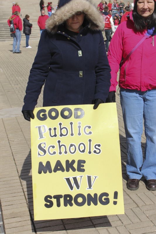 On February 22, 2018, thousands of West Virginia public school teachers and school service employees walked out of their classrooms in what would become a nine-day statewide strike. Teachers demands included a 5% raise and affordable healthcare coverage through the West Virginia Public Employees Insurance Agency or PEIA. These photos are part of a series of photos, videos, and interviews documenting the labor lore and expressive culture of the 2018 and 2019 West Virginia Teachers Strike.For more information on the 2018 and 2019 West Virginia Teachers Strike visit e-WV: https://www.wvencyclopedia.org/articles/2454