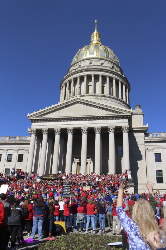 ["On February 22, 2018, thousands of West Virginia public school teachers and school service employees walked out of their classrooms in what would become a nine-day statewide strike. Teachers demands included a 5% raise and affordable healthcare coverage through the West Virginia Public Employees Insurance Agency or PEIA. These photos are part of a series of photos, videos, and interviews documenting the labor lore and expressive culture of the 2018 and 2019 West Virginia Teachers Strike.For more information on the 2018 and 2019 West Virginia Teachers Strike visit e-WV: https://www.wvencyclopedia.org/articles/2454"]%