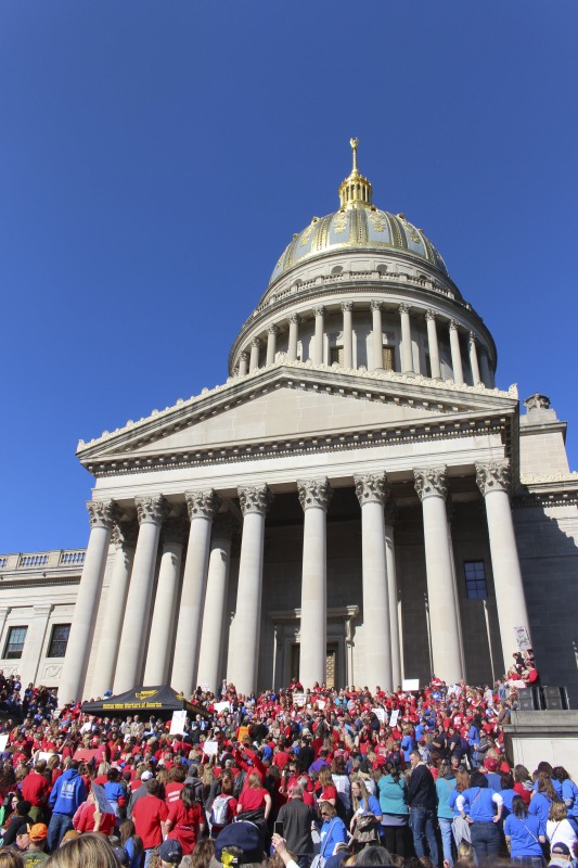 ["On February 22, 2018, thousands of West Virginia public school teachers and school service employees walked out of their classrooms in what would become a nine-day statewide strike. Teachers demands included a 5% raise and affordable healthcare coverage through the West Virginia Public Employees Insurance Agency or PEIA. These photos are part of a series of photos, videos, and interviews documenting the labor lore and expressive culture of the 2018 and 2019 West Virginia Teachers Strike.For more information on the 2018 and 2019 West Virginia Teachers Strike visit e-WV: https://www.wvencyclopedia.org/articles/2454"]%