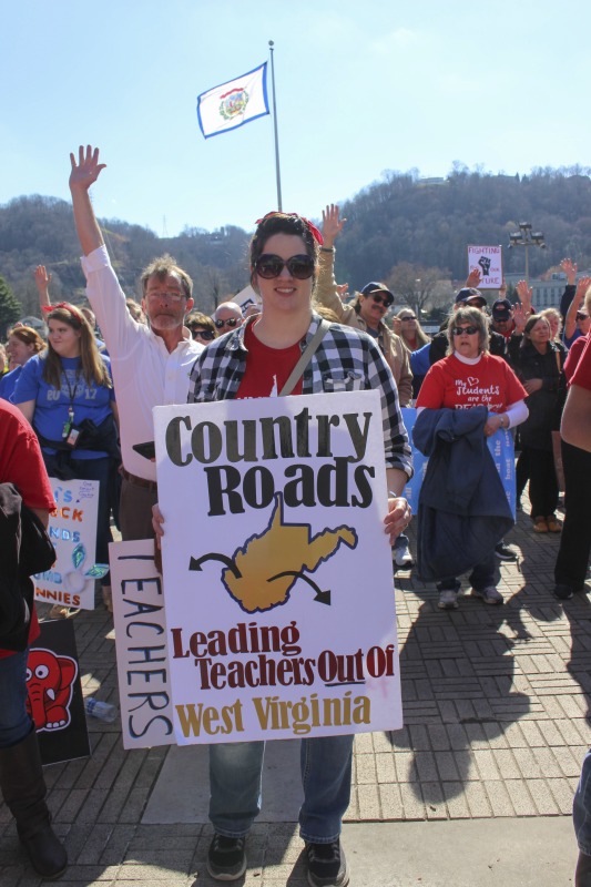 On February 22, 2018, thousands of West Virginia public school teachers and school service employees walked out of their classrooms in what would become a nine-day statewide strike. Teachers demands included a 5% raise and affordable healthcare coverage through the West Virginia Public Employees Insurance Agency or PEIA. These photos are part of a series of photos, videos, and interviews documenting the labor lore and expressive culture of the 2018 and 2019 West Virginia Teachers Strike.For more information on the 2018 and 2019 West Virginia Teachers Strike visit e-WV: https://www.wvencyclopedia.org/articles/2454