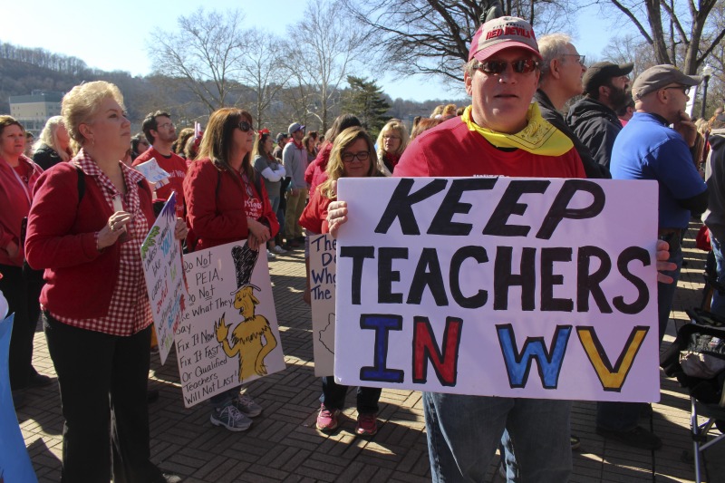 ["On February 22, 2018, thousands of West Virginia public school teachers and school service employees walked out of their classrooms in what would become a nine-day statewide strike. Teachers demands included a 5% raise and affordable healthcare coverage through the West Virginia Public Employees Insurance Agency or PEIA. These photos are part of a series of photos, videos, and interviews documenting the labor lore and expressive culture of the 2018 and 2019 West Virginia Teachers Strike.For more information on the 2018 and 2019 West Virginia Teachers Strike visit e-WV: https://www.wvencyclopedia.org/articles/2454"]%