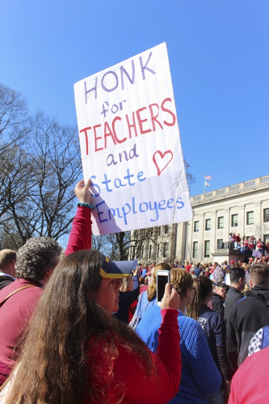 ["On February 22, 2018, thousands of West Virginia public school teachers and school service employees walked out of their classrooms in what would become a nine-day statewide strike. Teachers demands included a 5% raise and affordable healthcare coverage through the West Virginia Public Employees Insurance Agency or PEIA. These photos are part of a series of photos, videos, and interviews documenting the labor lore and expressive culture of the 2018 and 2019 West Virginia Teachers Strike.For more information on the 2018 and 2019 West Virginia Teachers Strike visit e-WV: https://www.wvencyclopedia.org/articles/2454"]%