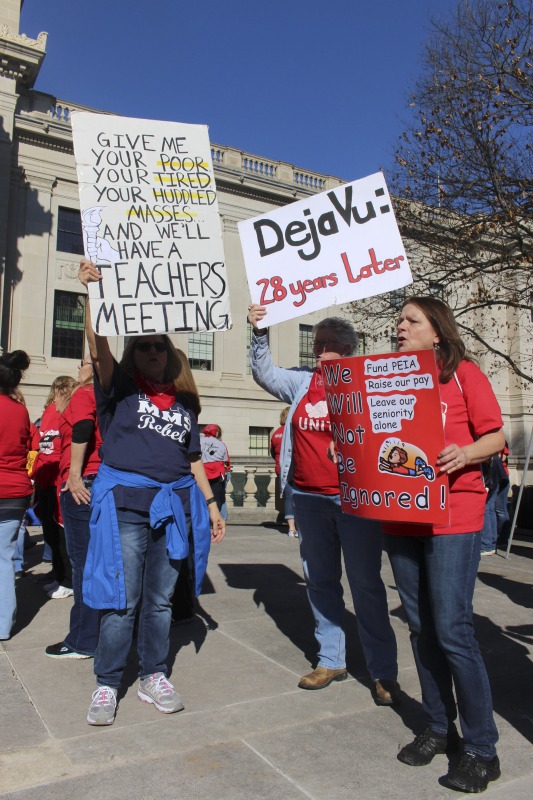 ["On February 22, 2018, thousands of West Virginia public school teachers and school service employees walked out of their classrooms in what would become a nine-day statewide strike. Teachers demands included a 5% raise and affordable healthcare coverage through the West Virginia Public Employees Insurance Agency or PEIA. These photos are part of a series of photos, videos, and interviews documenting the labor lore and expressive culture of the 2018 and 2019 West Virginia Teachers Strike.For more information on the 2018 and 2019 West Virginia Teachers Strike visit e-WV: https://www.wvencyclopedia.org/articles/2454"]%