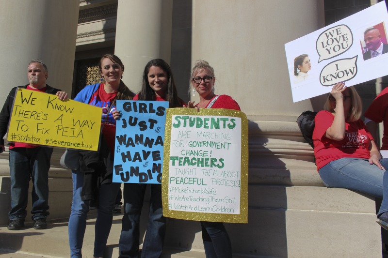 ["On February 22, 2018, thousands of West Virginia public school teachers and school service employees walked out of their classrooms in what would become a nine-day statewide strike. Teachers demands included a 5% raise and affordable healthcare coverage through the West Virginia Public Employees Insurance Agency or PEIA. These photos are part of a series of photos, videos, and interviews documenting the labor lore and expressive culture of the 2018 and 2019 West Virginia Teachers Strike.For more information on the 2018 and 2019 West Virginia Teachers Strike visit e-WV: https://www.wvencyclopedia.org/articles/2454"]%